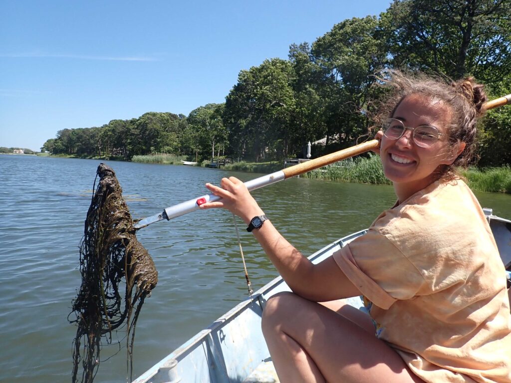 Brittney Scannell sampling macrophyte density