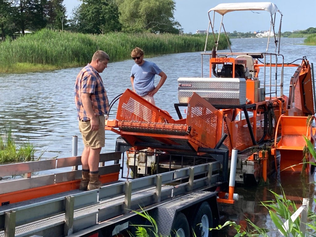 Pete Grimes & Robert Anderson with harvester